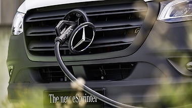 The charging port is hidden behind the Mercedes star.