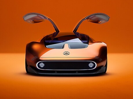 The orange and black gullwing doors make the sports car a design icon.