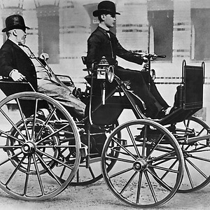 Gottlieb Daimler and his son Adolf on the motor car (motor carriage), 1886.