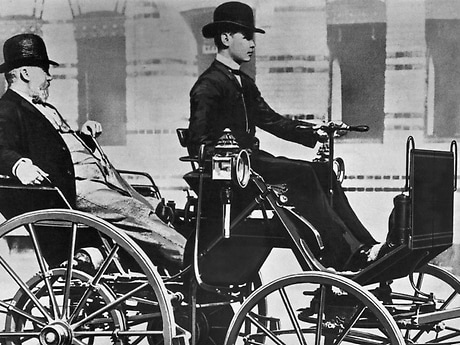 Gottlieb Daimler and his son Adolf on the motor car (motor carriage), 1886.