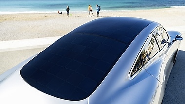 The power from the solar roof feeds the 12-volt battery, which in turn supplies auxiliary loads. 