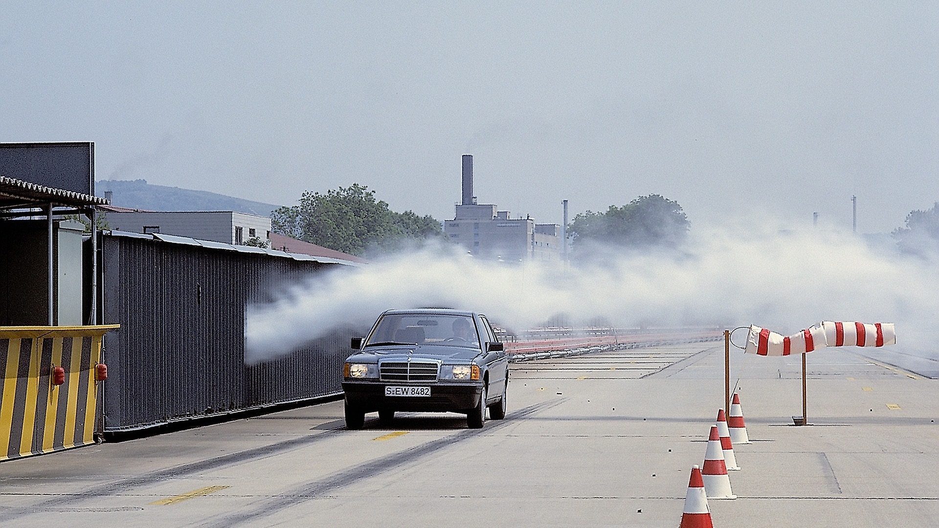 A Mercedes-Benz 201-series Saloon undergoes crosswind testing at the Untertürkheim plant.