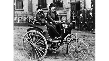 Iconic and historic: the Daimler motorised carriage with wooden spoked wheels.