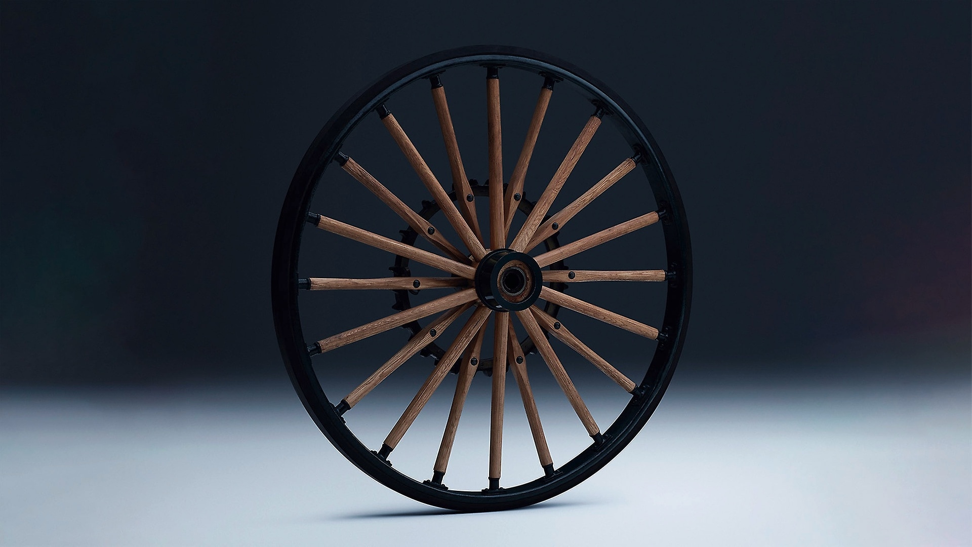 The wooden spoked wheel of the Daimler motorised carriage.