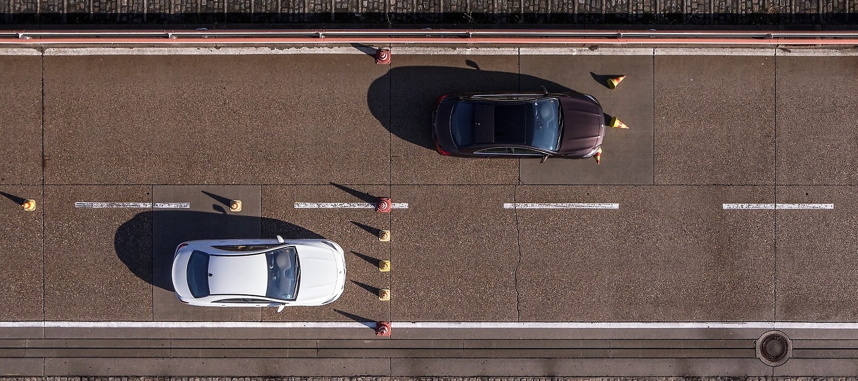The car with the fake brake pads (above in the picture) has a significantly longer braking distance.