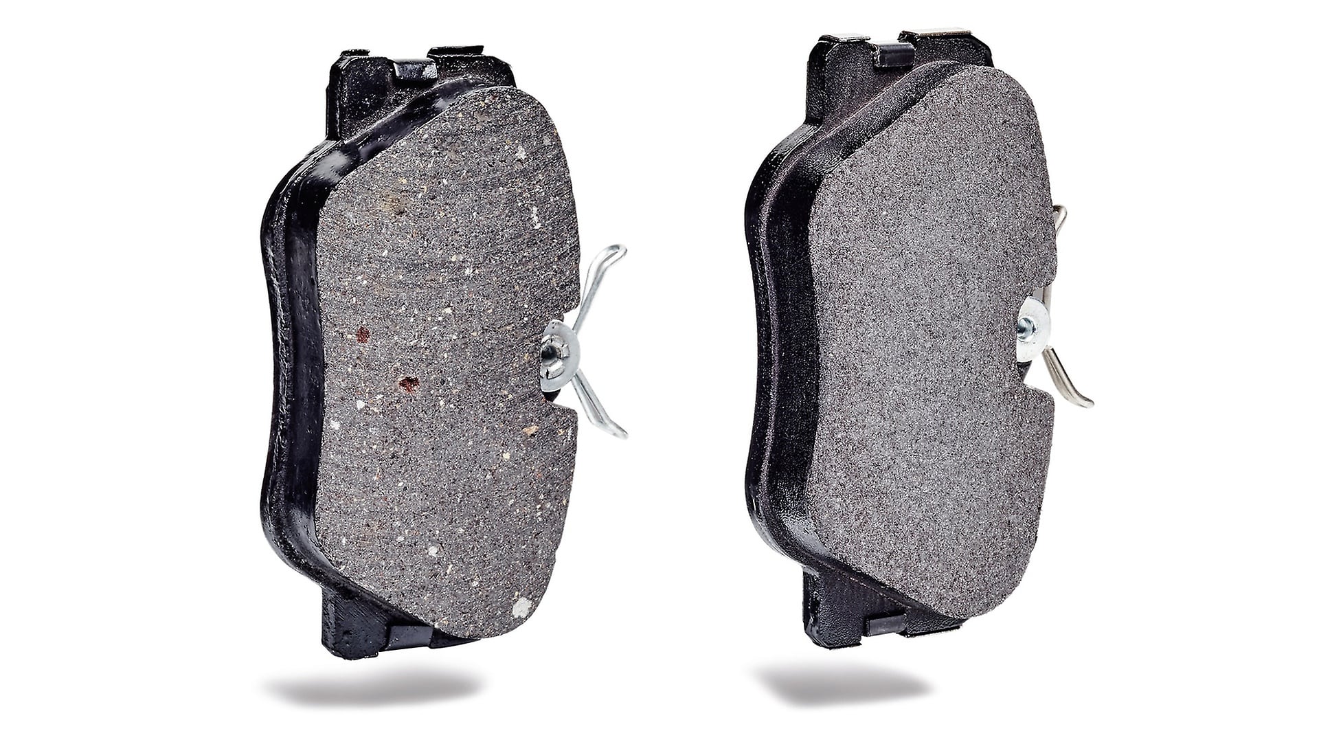 Brake pads after stress test: Counterfeit (left) and original (right).